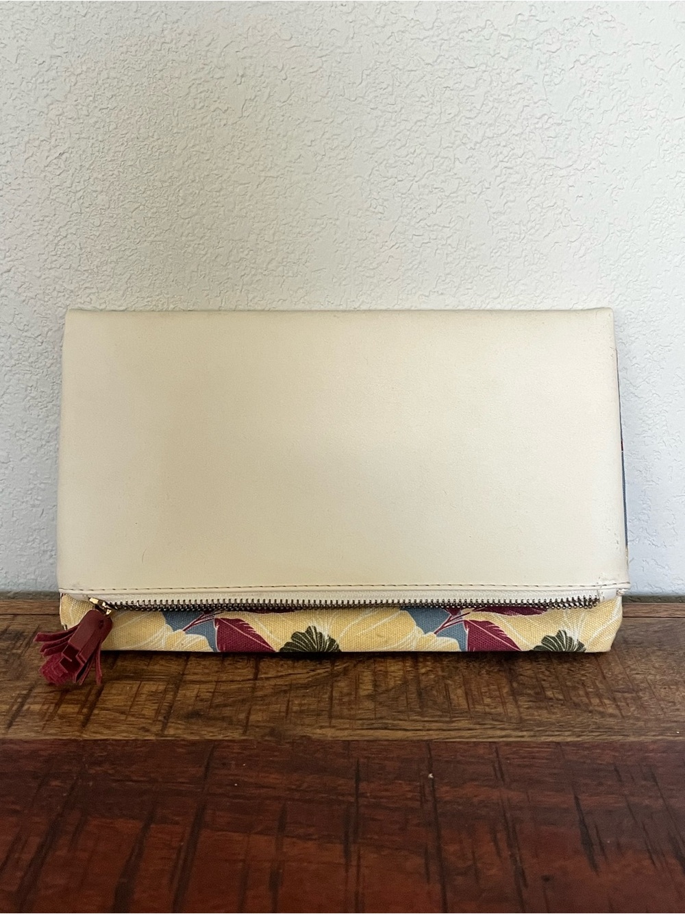 Rachel Pally Reversible Cream Fold-Over Clutch with Floral Accent and Tassel